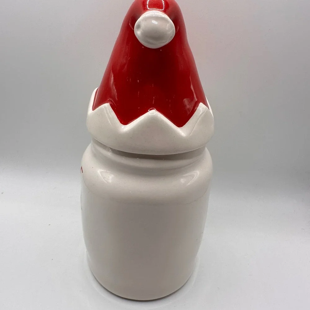 Rae Dunn Jingle Bells Christmas Canister with Santa Hat Lid Magenta Ceramic Jar