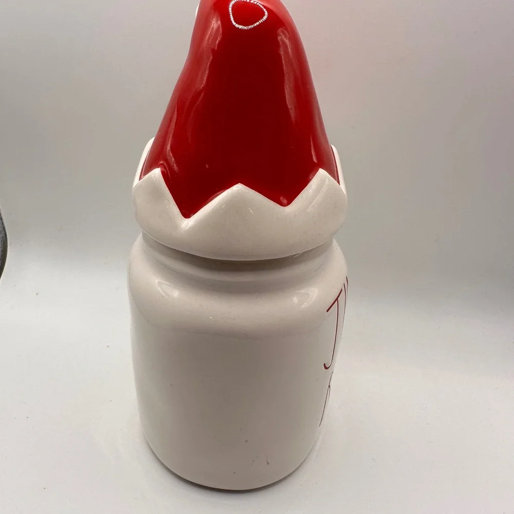 Rae Dunn Jingle Bells Christmas Canister with Santa Hat Lid Magenta Ceramic Jar