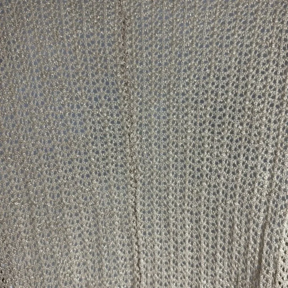 Poof! poof sweater