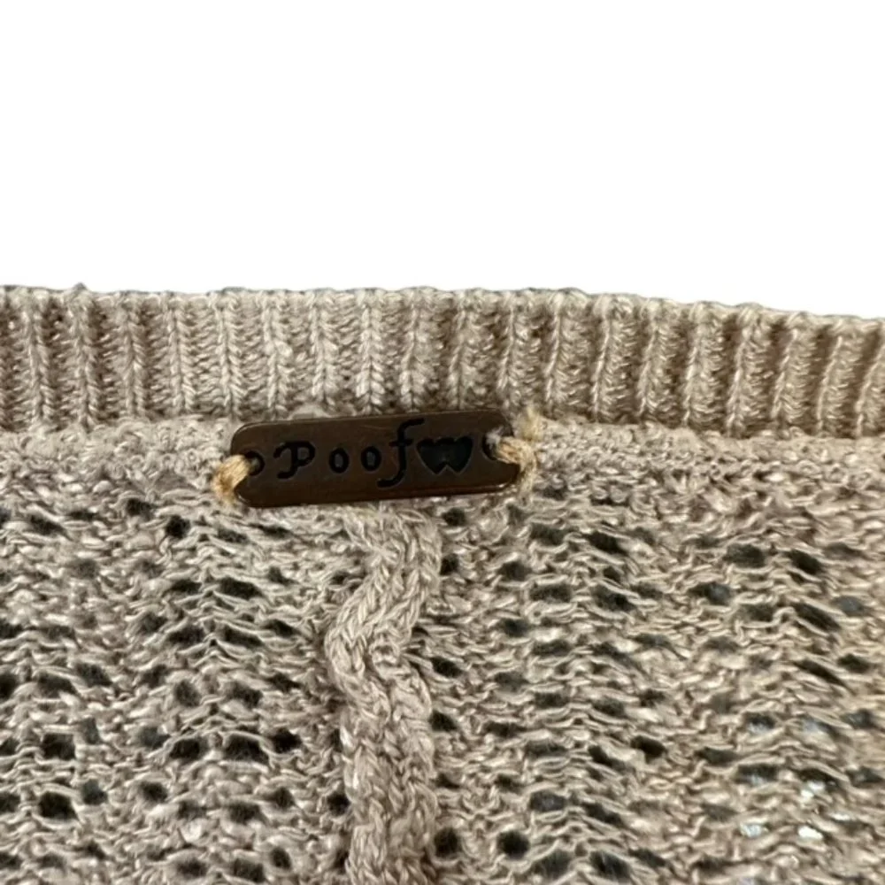 Poof! poof sweater