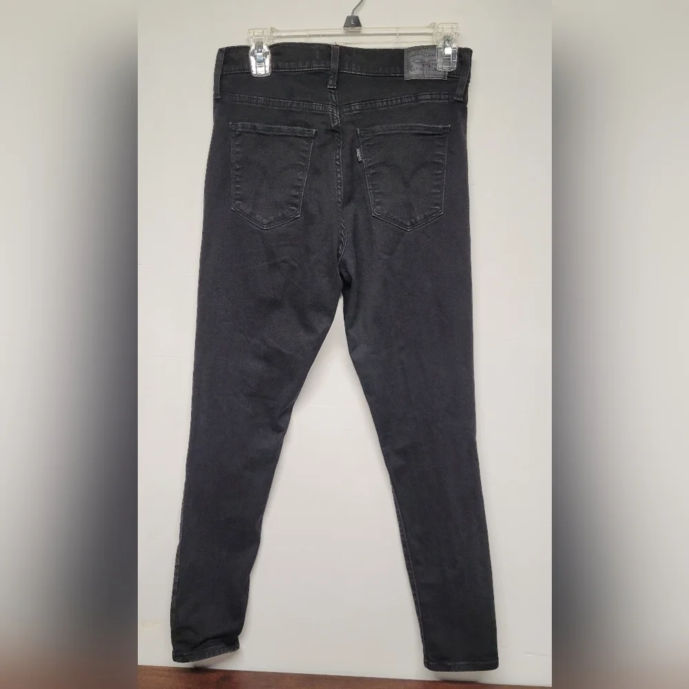 Signature by Levi Strauss laying flat