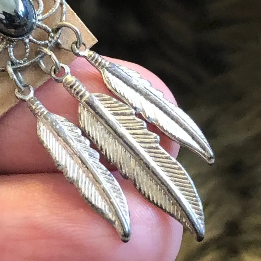 Vintage silver plated feather hematite earrings