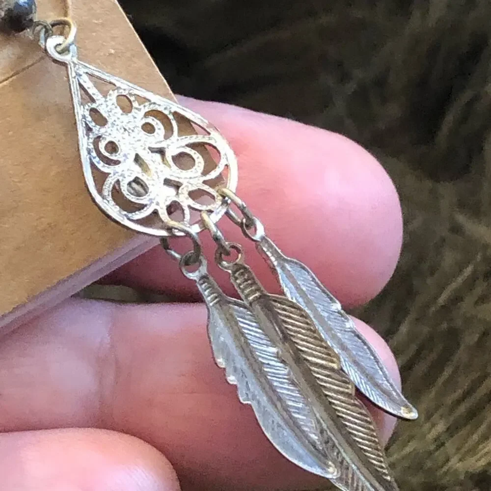 Vintage silver plated feather hematite earrings