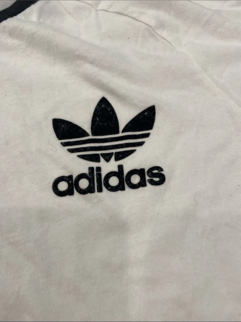 adidas iconic trefoil