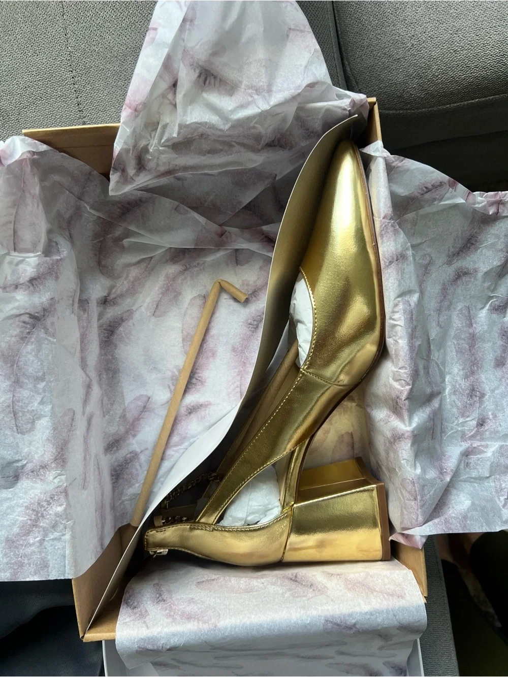 Jessica Simpson shiny gold