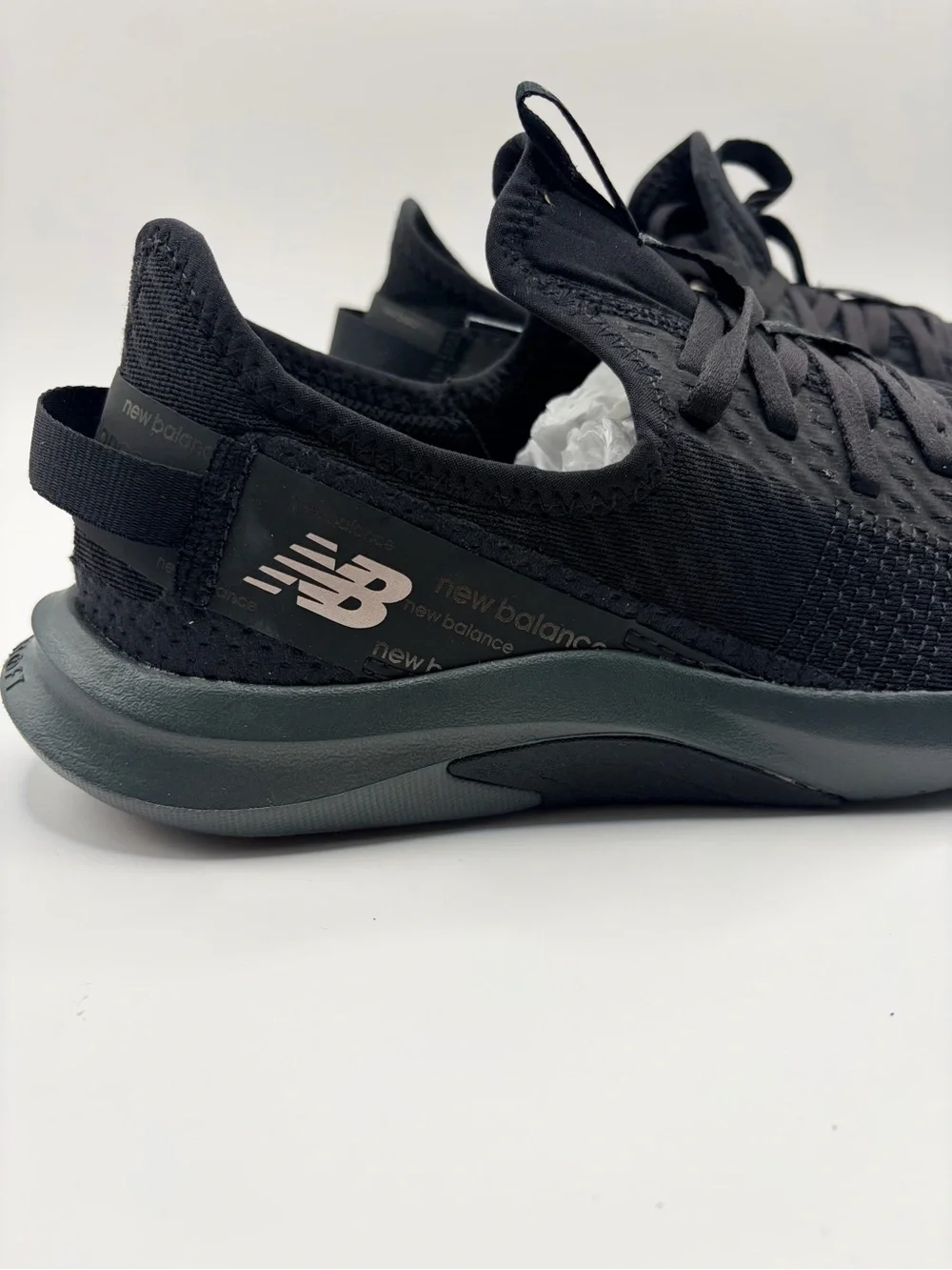 New Balance Women’s Black Knit Slip-On Sneakers with Dark Gray Sole