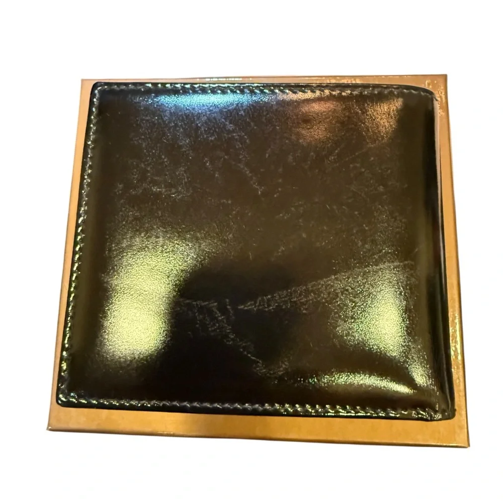 Gucci Men’s Black Leather Bi Fold Wallet Silver tone G Logo