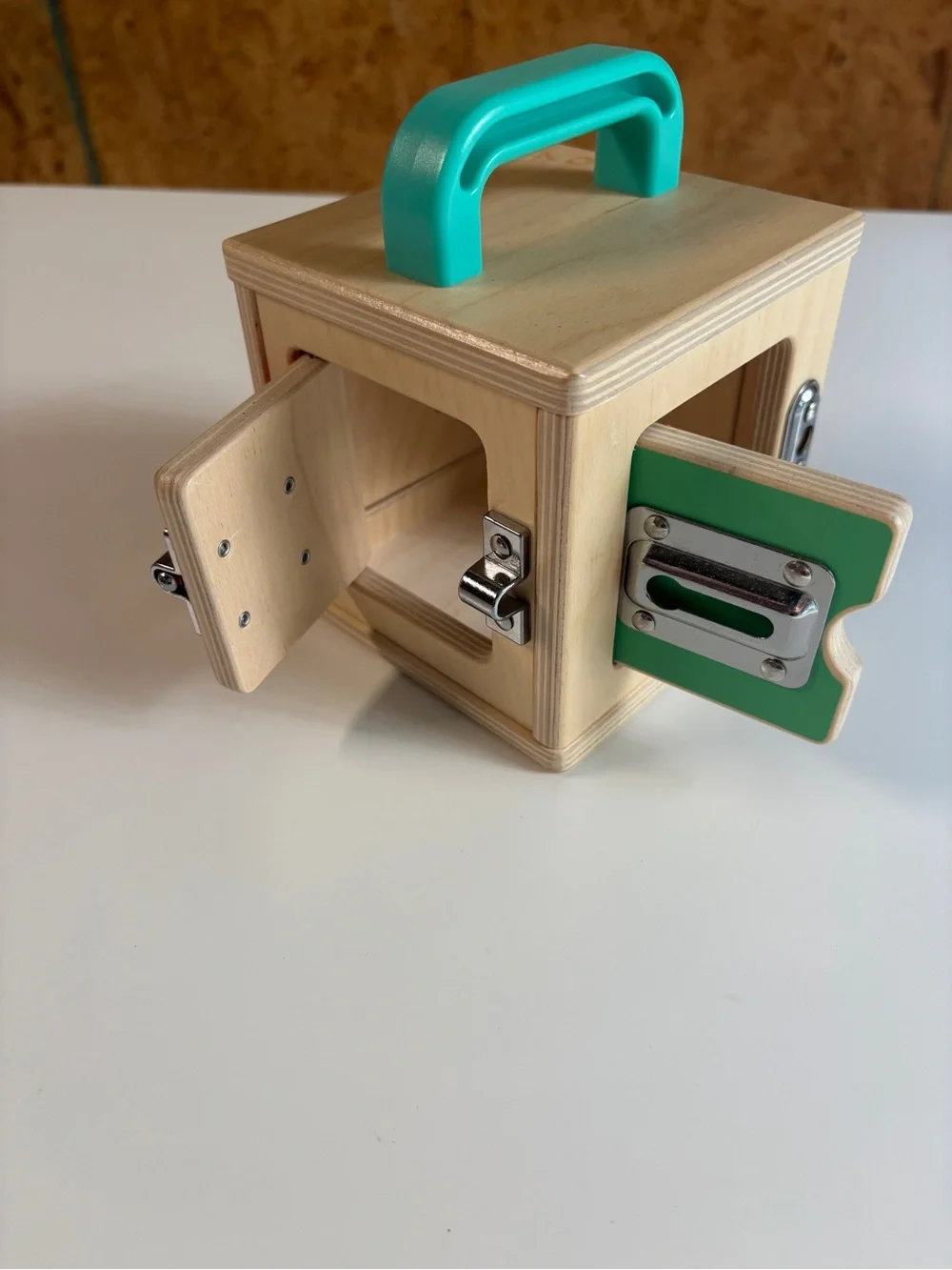 Wooden Lock Box Toy with Turquoise Handle and Red Door
