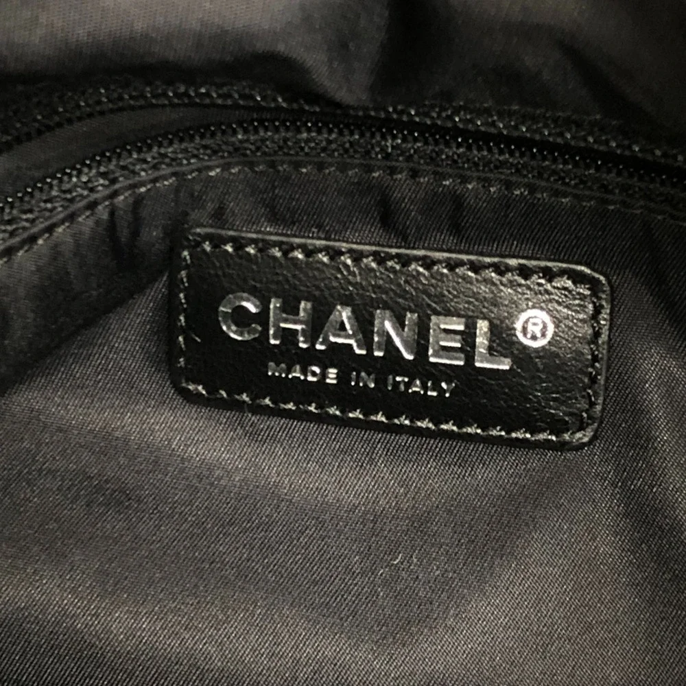 CHANEL black leather