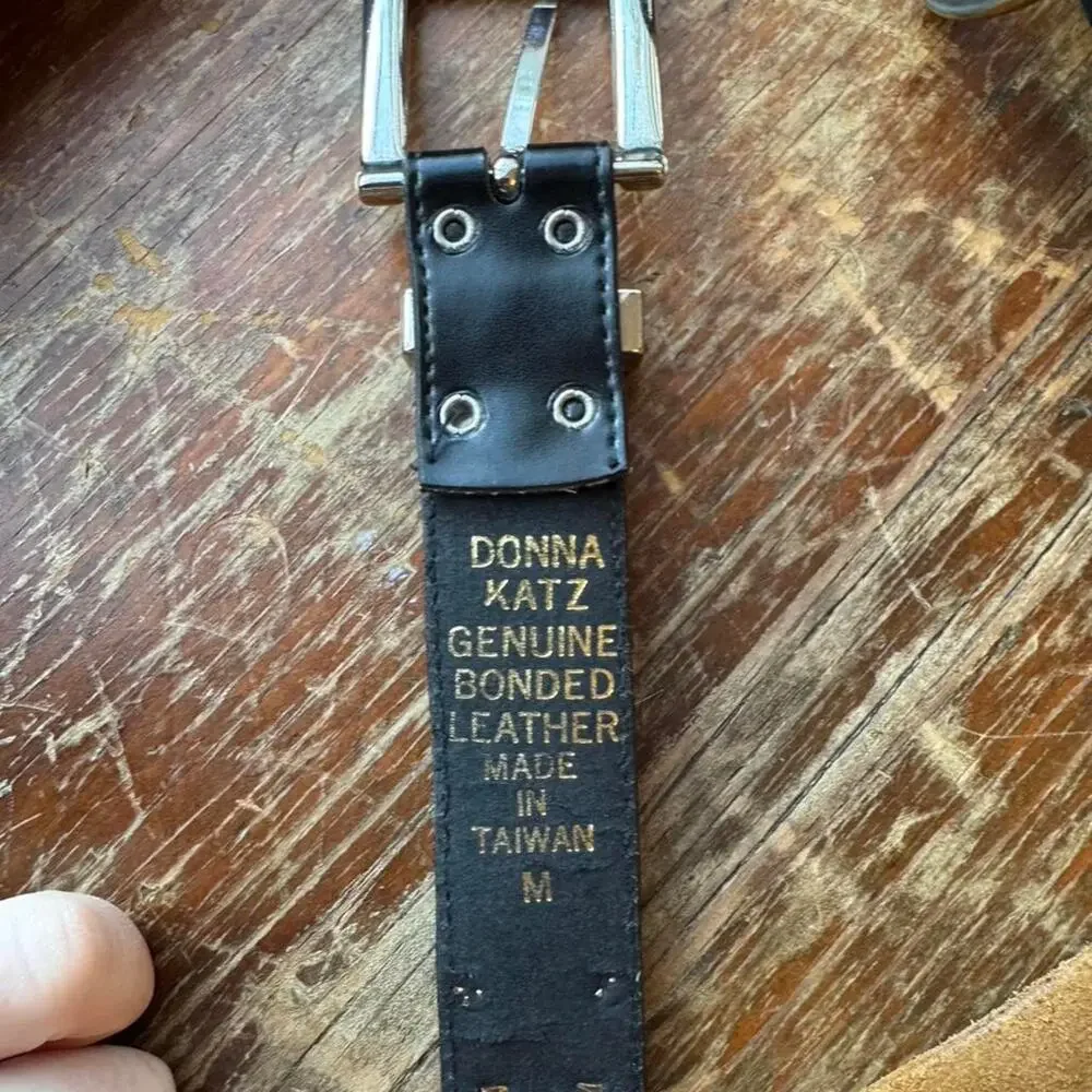 Donna Katz black coin