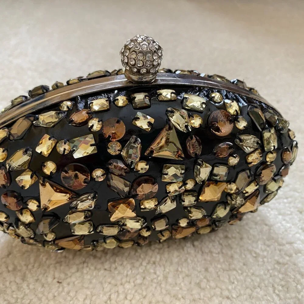 NWOT, bejeweled clamshell purse, chain strap, rhinestone clasp.