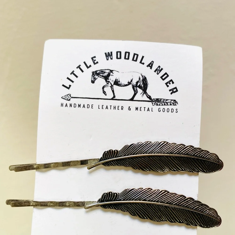 Little Woodlander silver feather