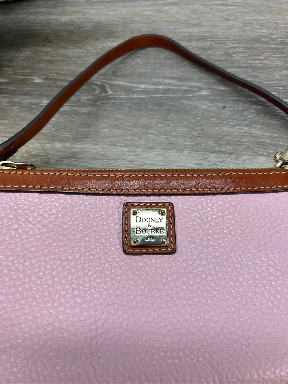 3661 Dooney & Bourke Brown Leather Wristlet with Red Lining 053661