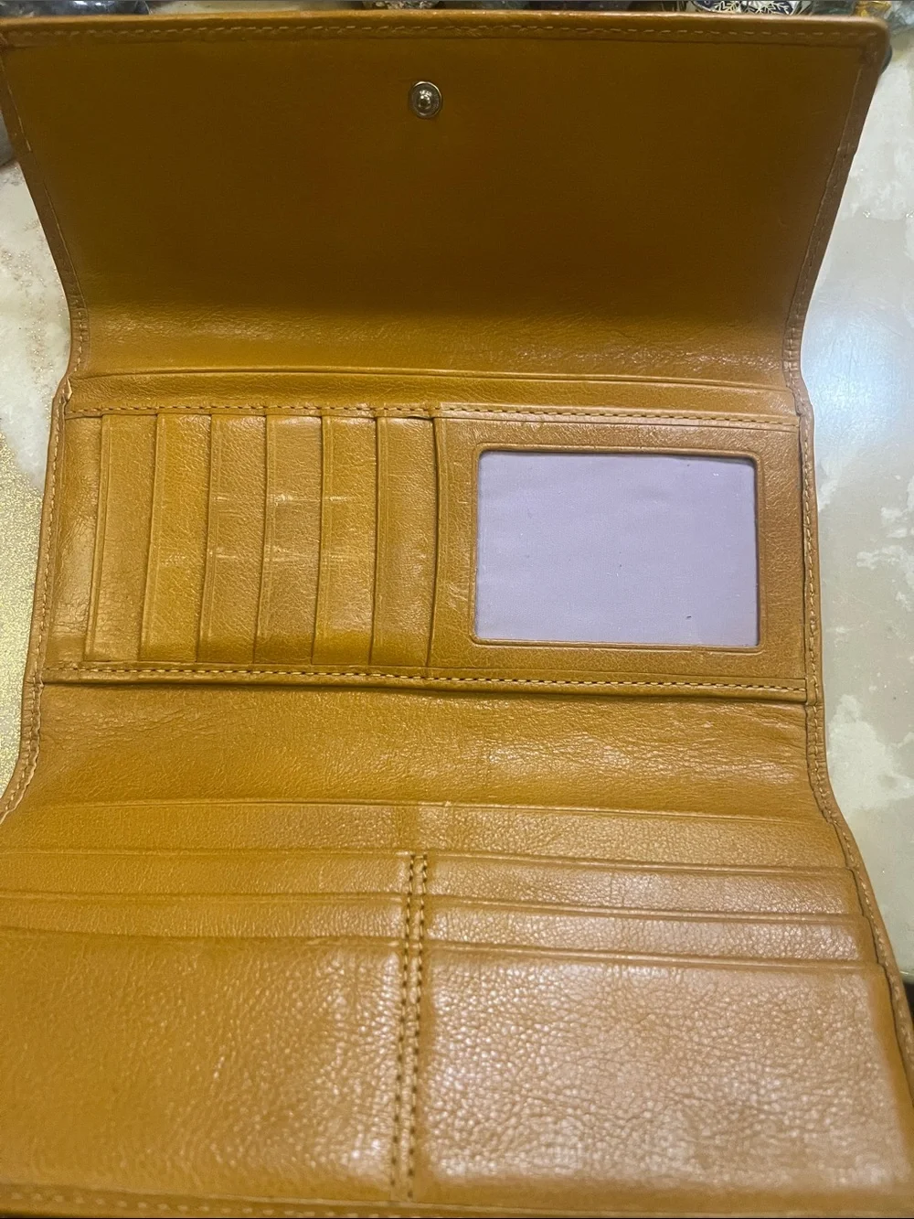 Coach leather fold
