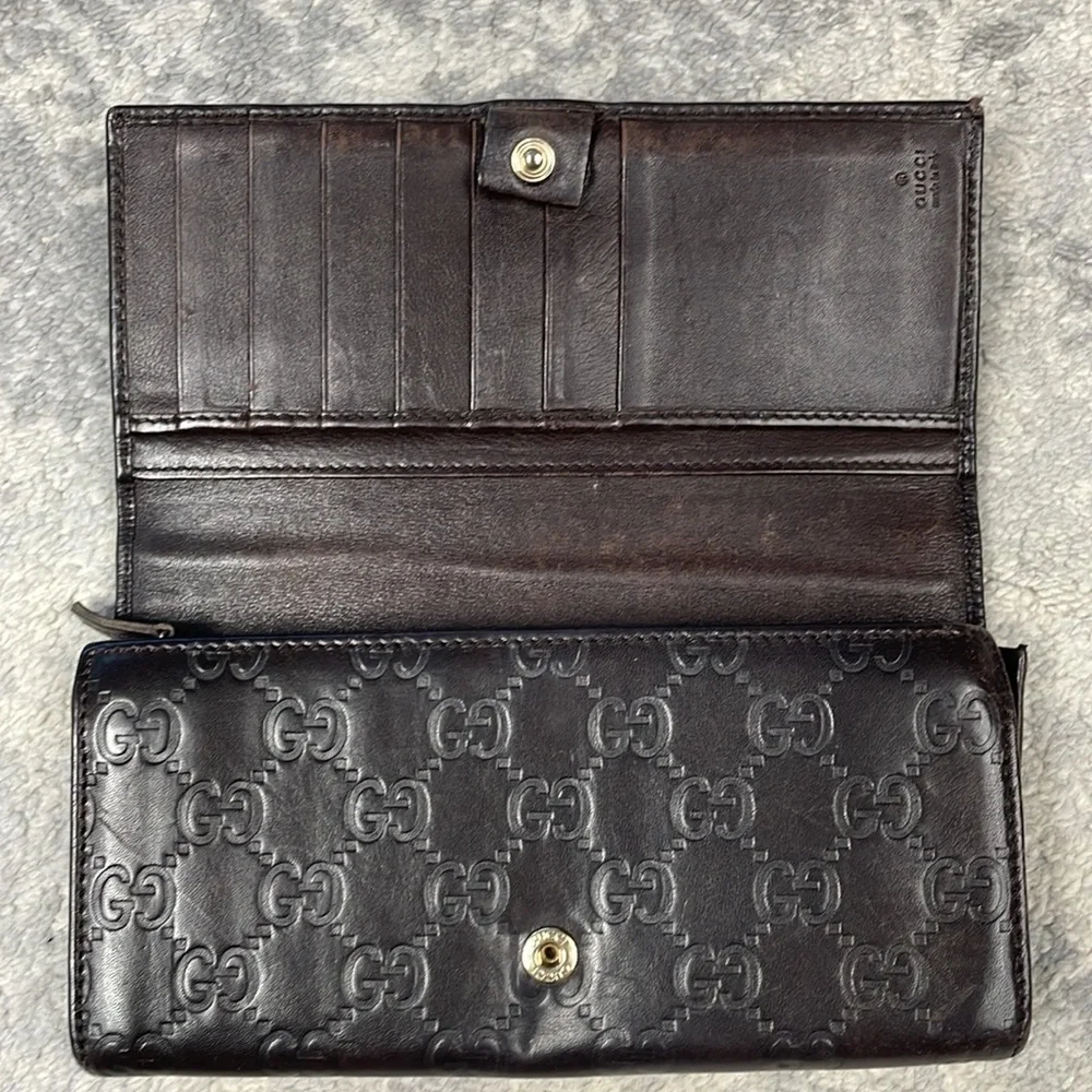 Gucci dark very embossed