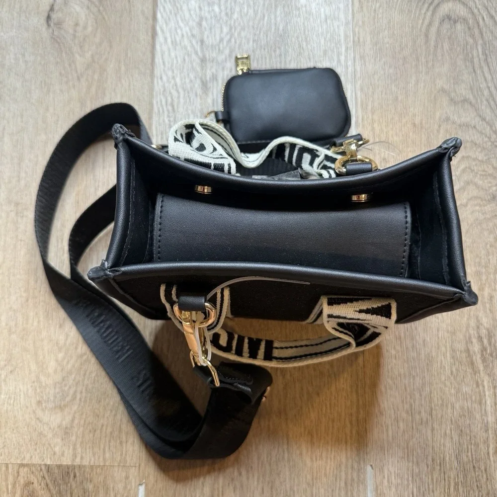 Steve Madden handle addition leather