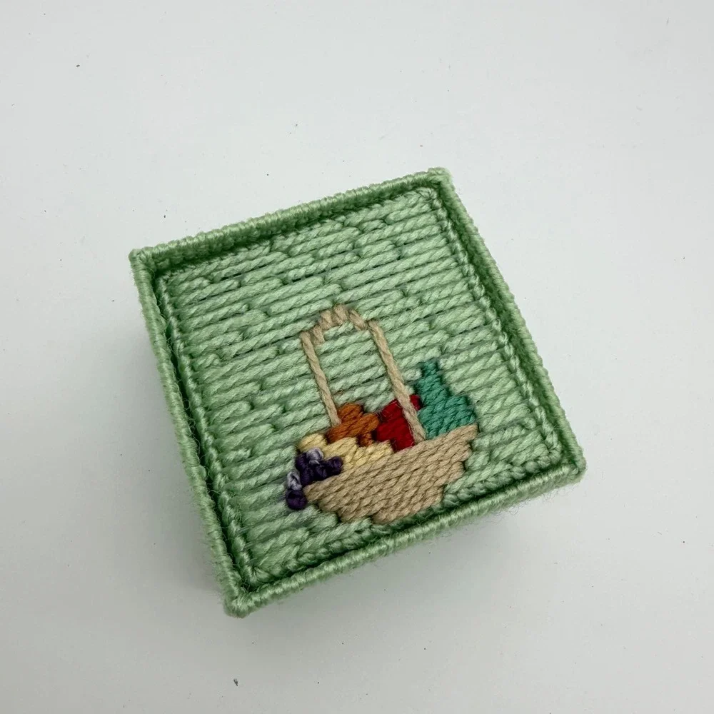 Handmade needlepoint coaster