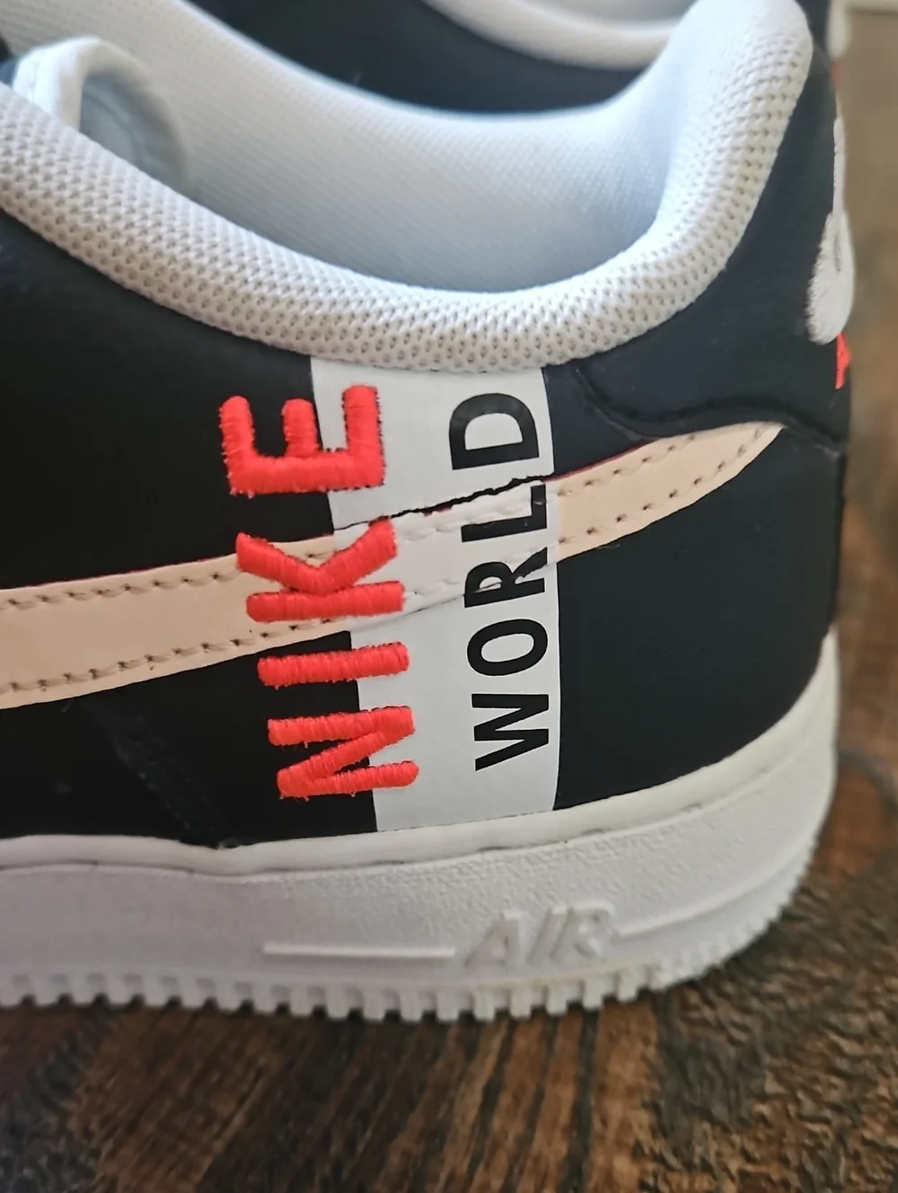 Nike Air Black Leather Sneakers with Peachy Pink Swoosh & World Worlwide Emblem