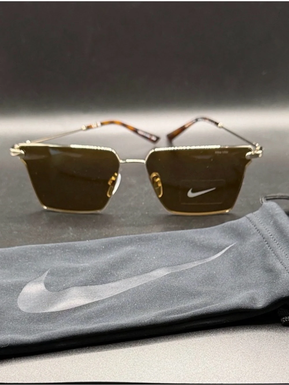 Nike gold metal