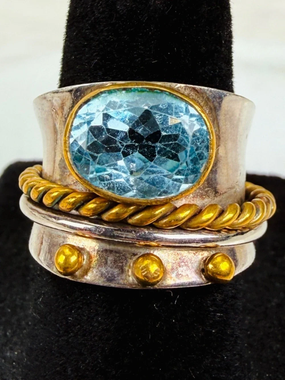 Beautiful size 5 1/2 Silvertone and bronze stamped 925 blue topaz, spinner ring