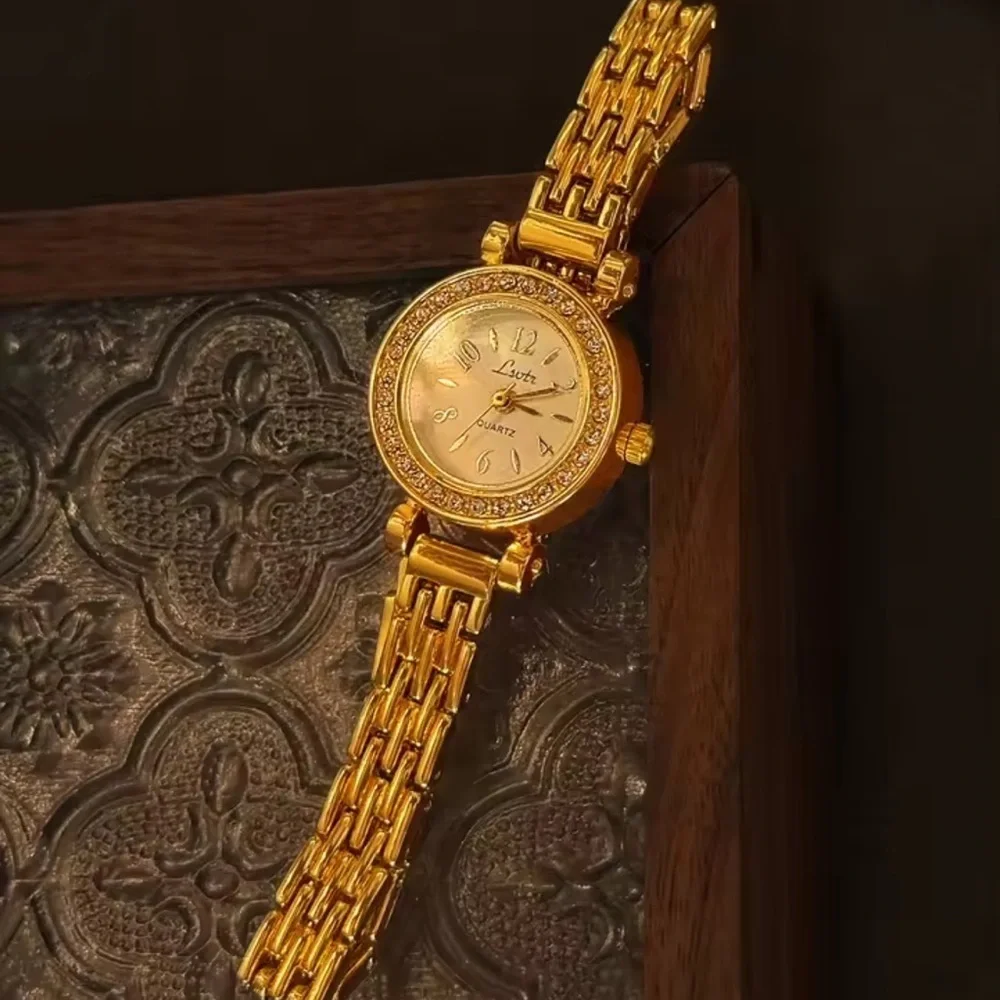 Anthropologie luxurious gold