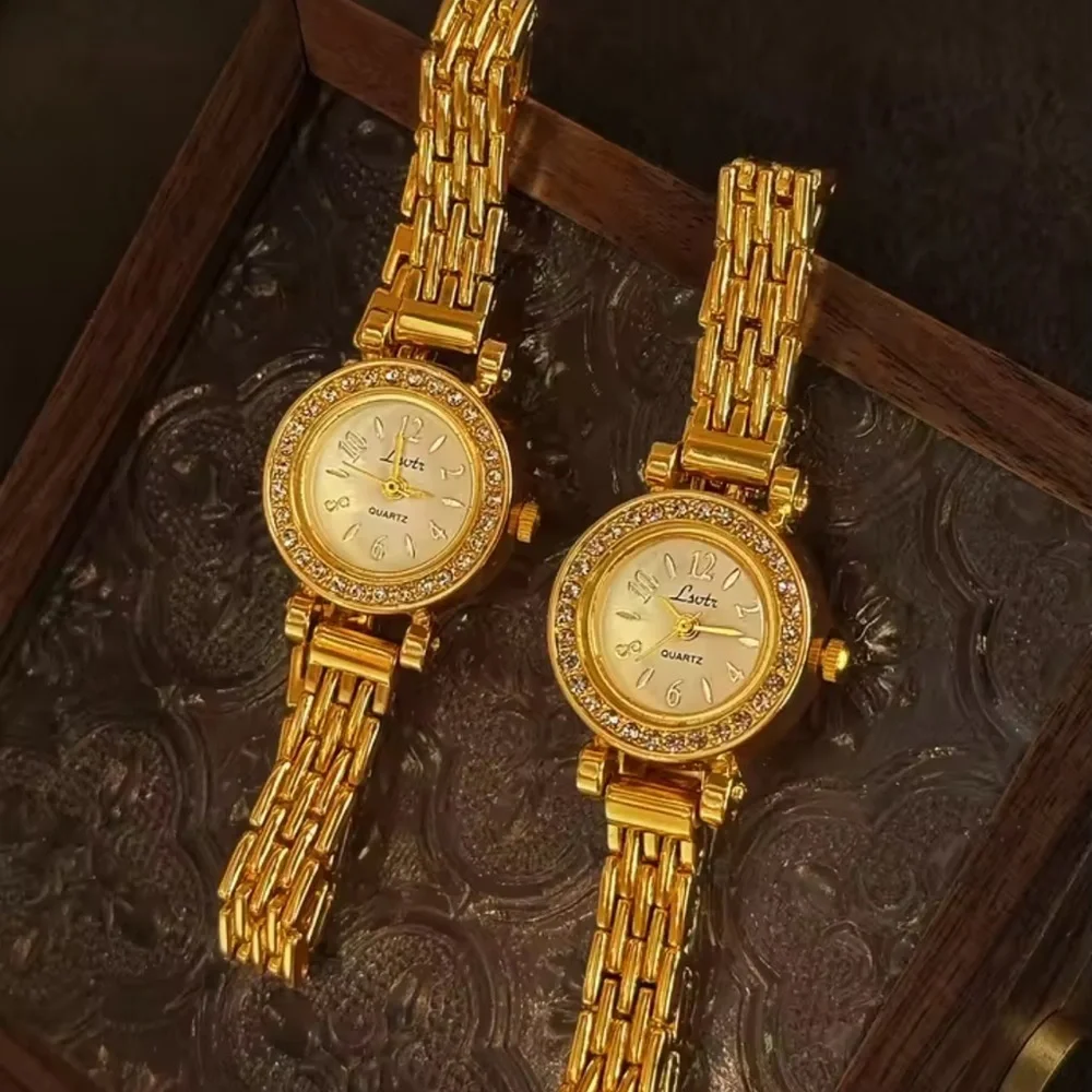 Anthropologie luxurious gold