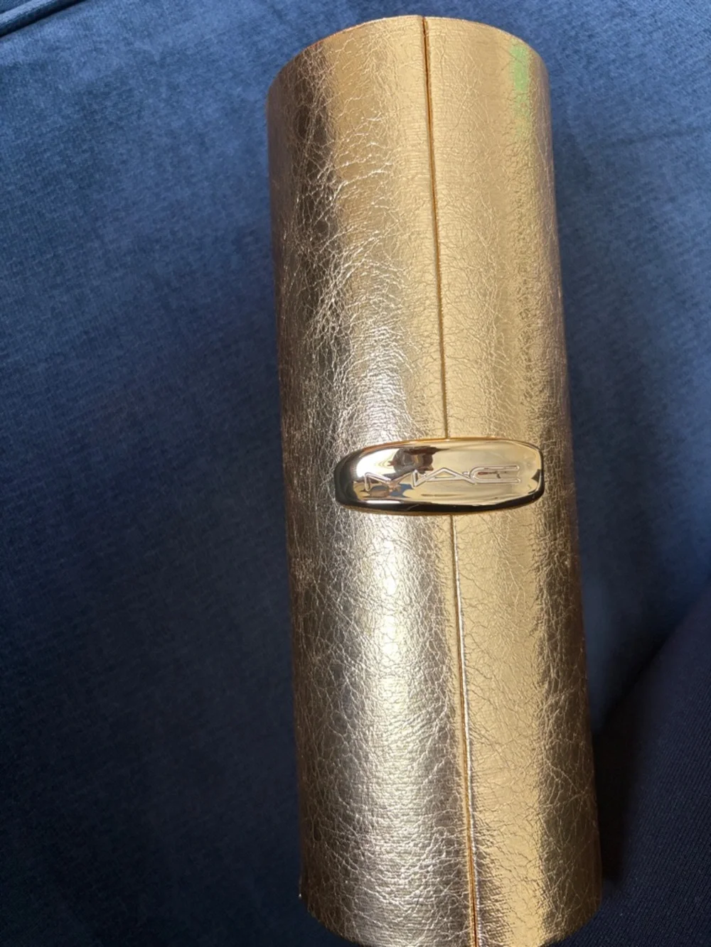 MAC Cosmetics sleek gold