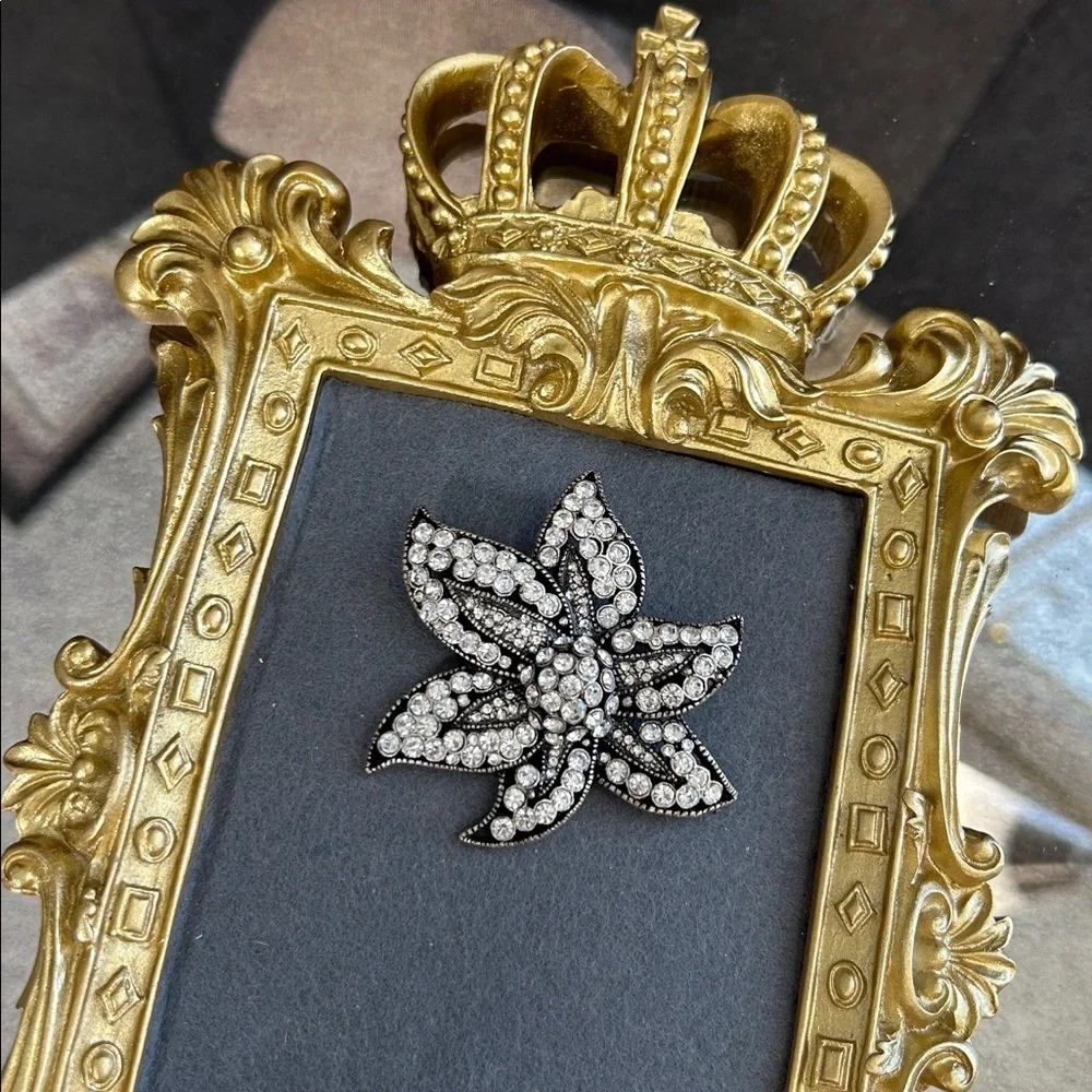 Elegant Black and Silver Floral Brooch