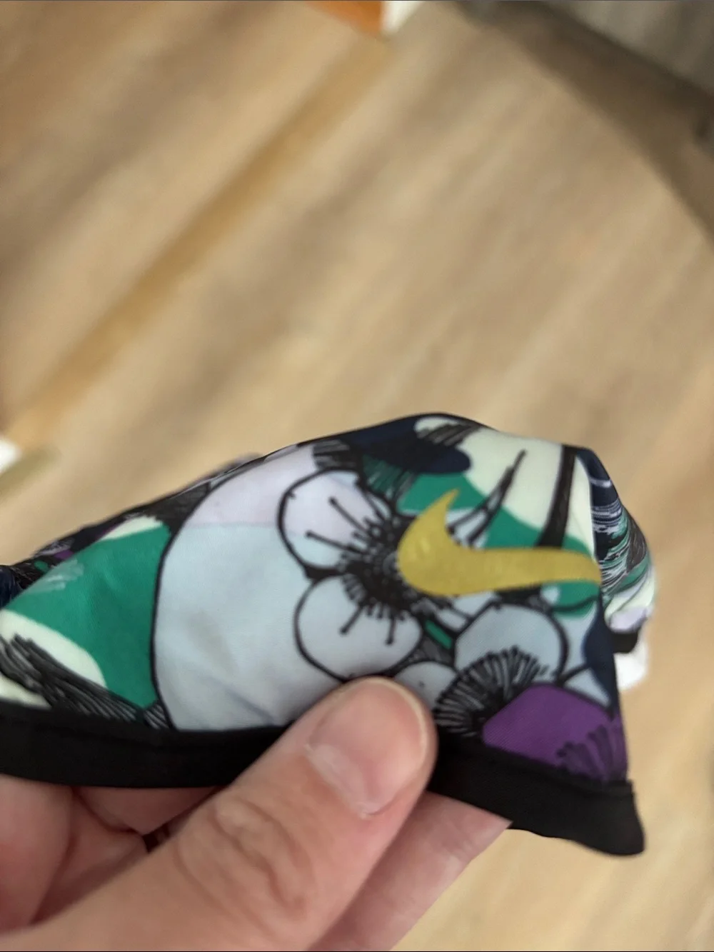 Nike tiny logo second