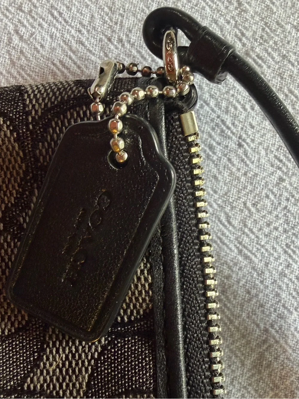 Coach wristlet signature