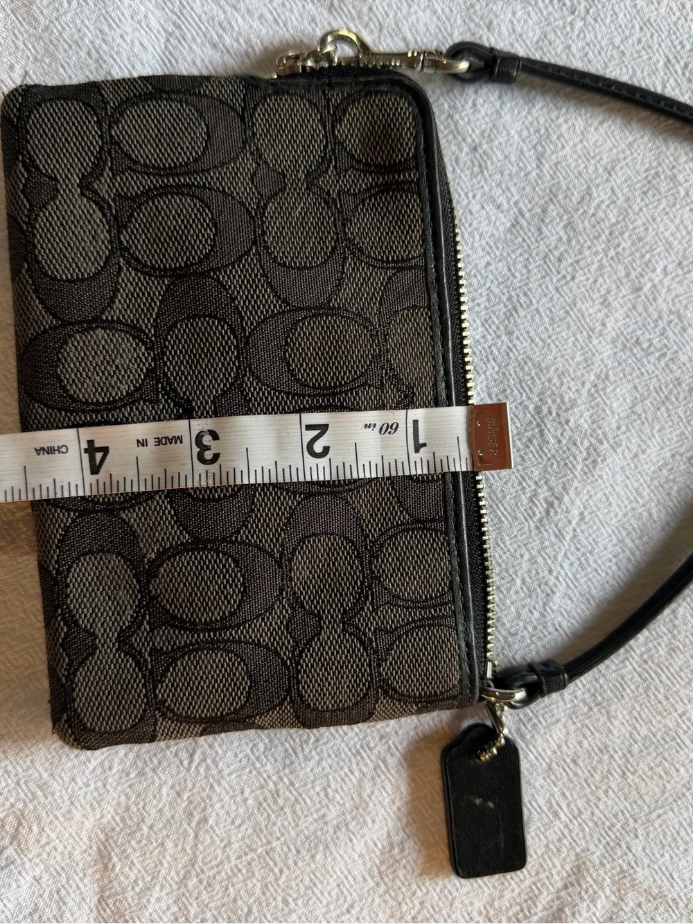 Coach wristlet signature