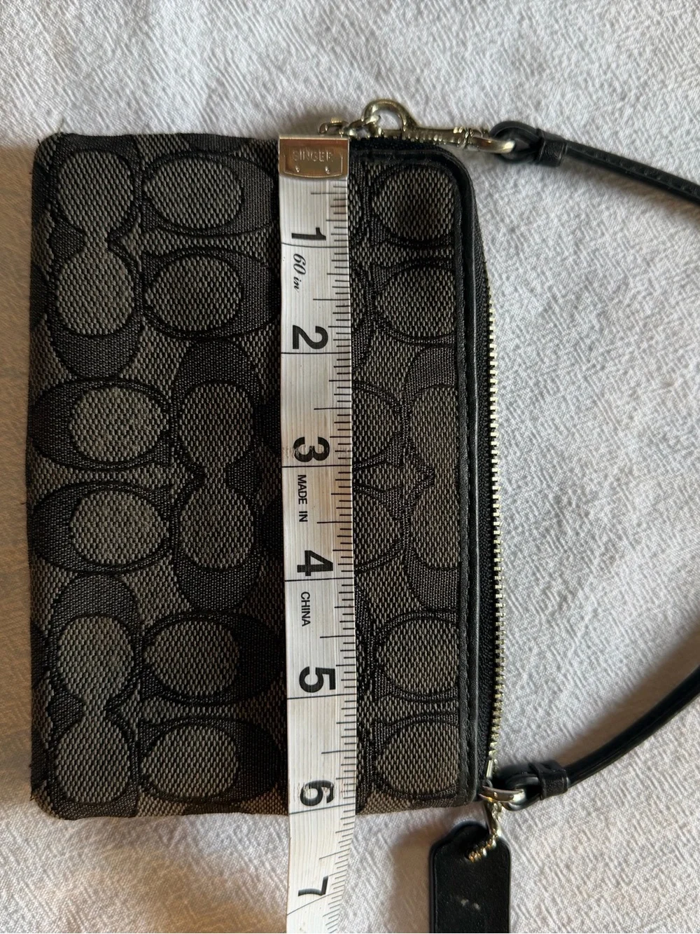 Coach wristlet signature