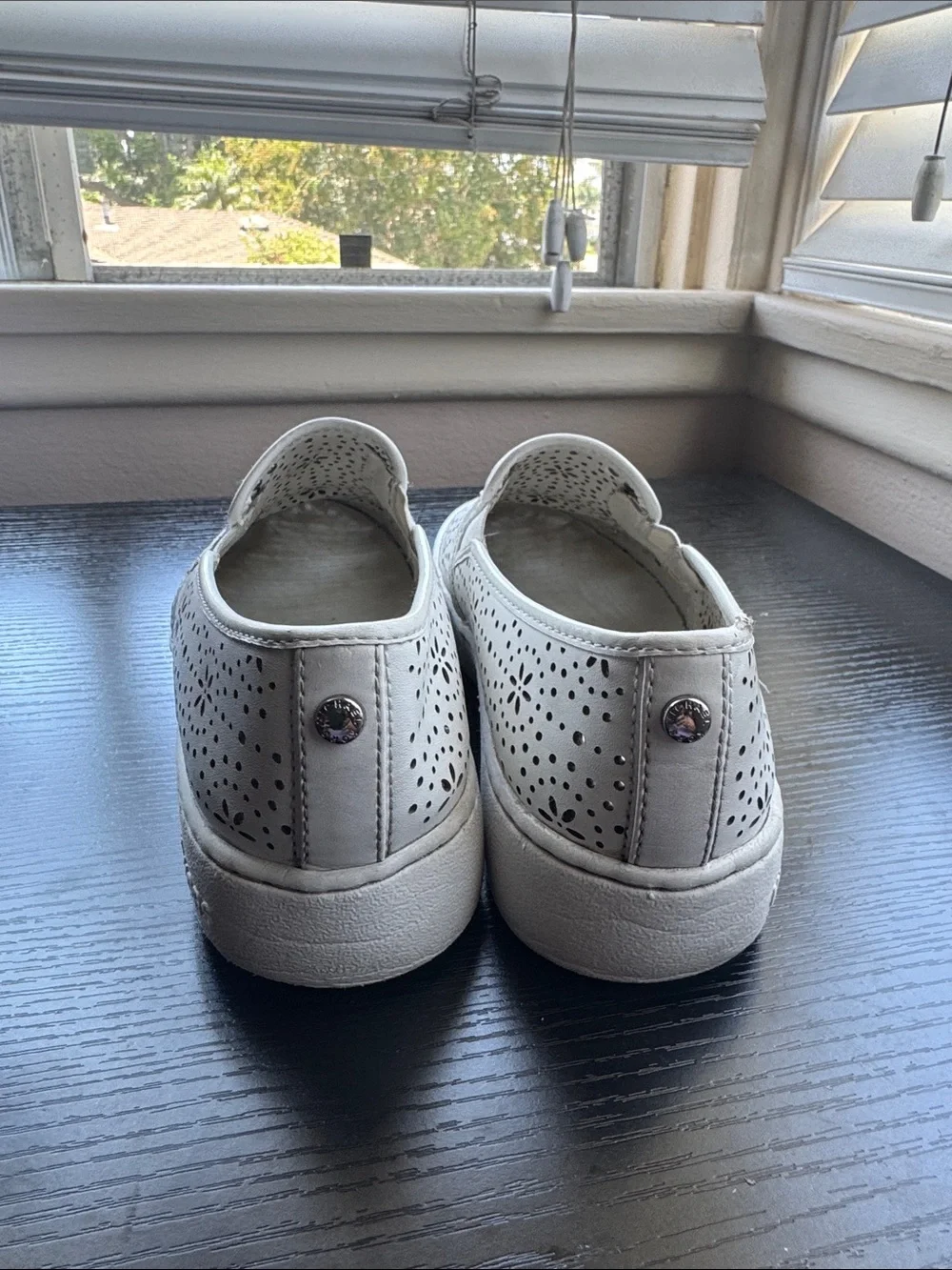 Michael Kors White Perforated Slip-On Sneakers with Floral Cutouts