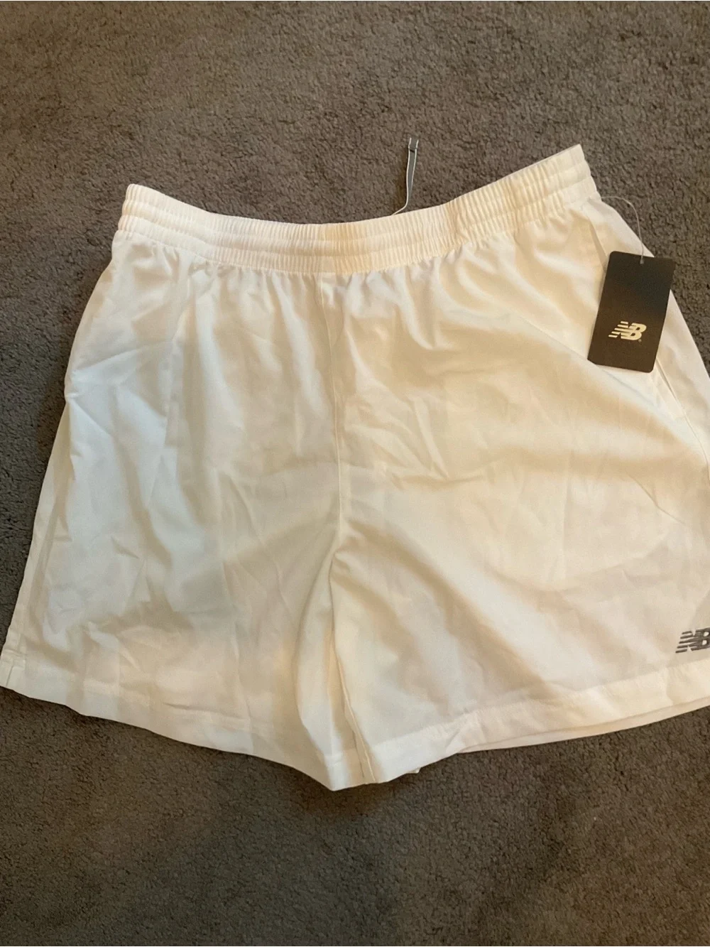 New Balance White Athletic Shorts with Black Logo Tag