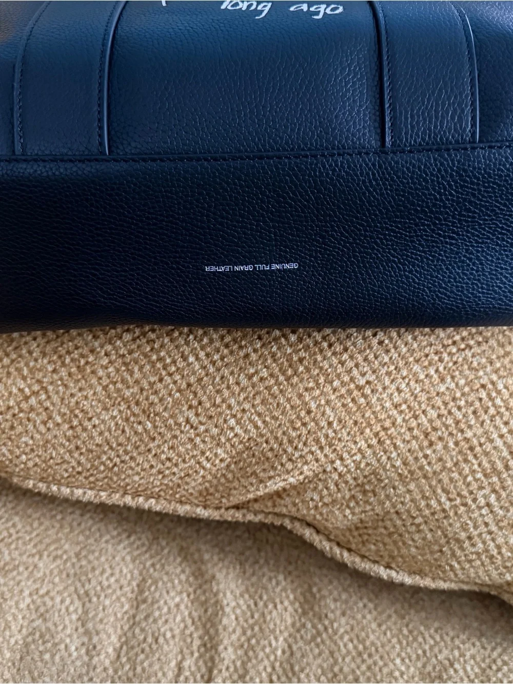 Coach sleek leather