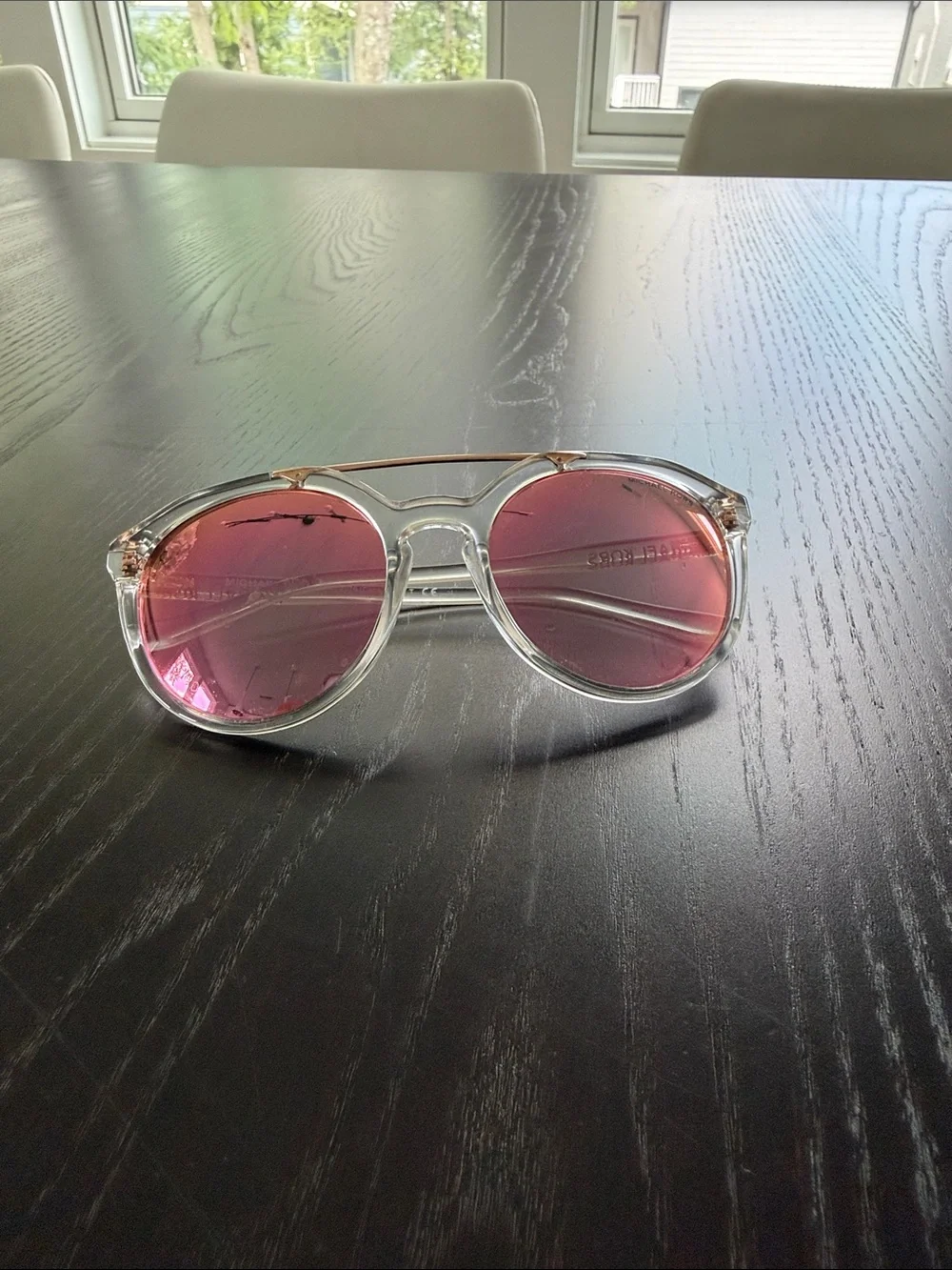 MICHAEL KORS Clear Frame Sunglasses with Pink Mirrored Lenses
