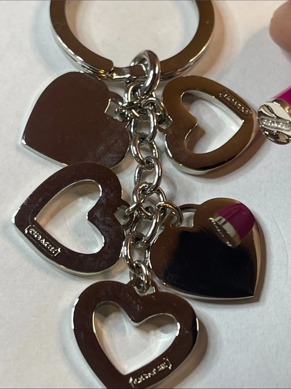 Coach branded heart