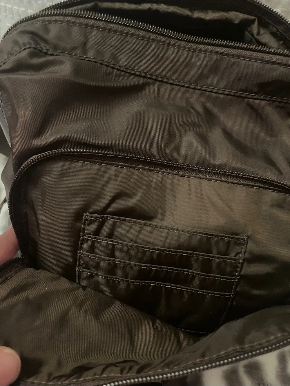 Tumi compact crossbody