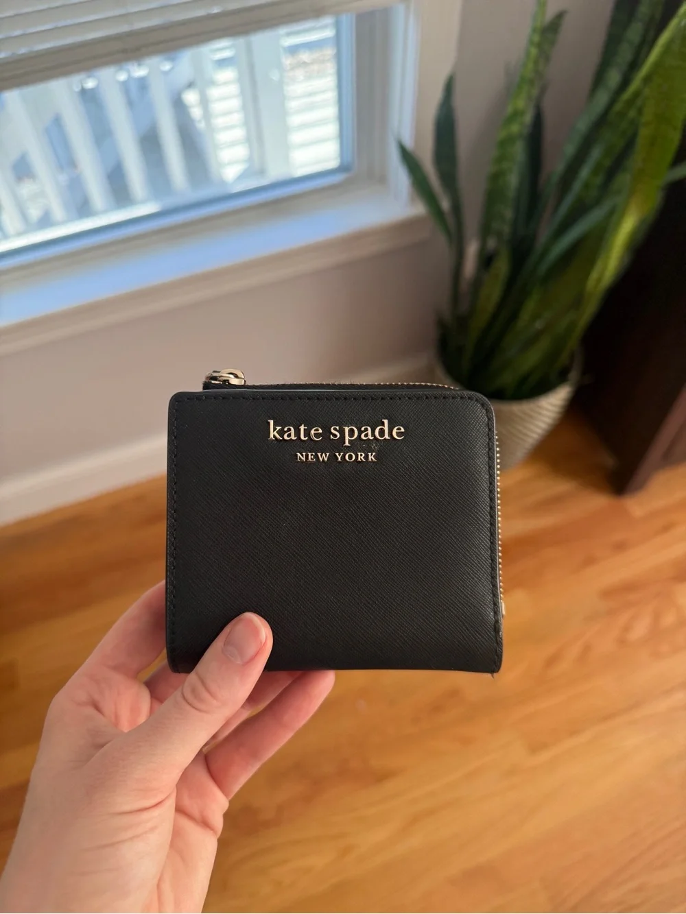 kate spade Black Saffiano Zip Around Wallet with Gold Logo