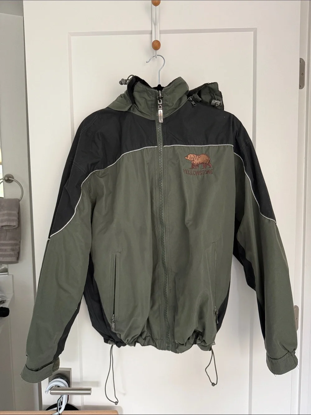 Yellowstone Reversible Hooded Rain Jacket in Olive Green and Black