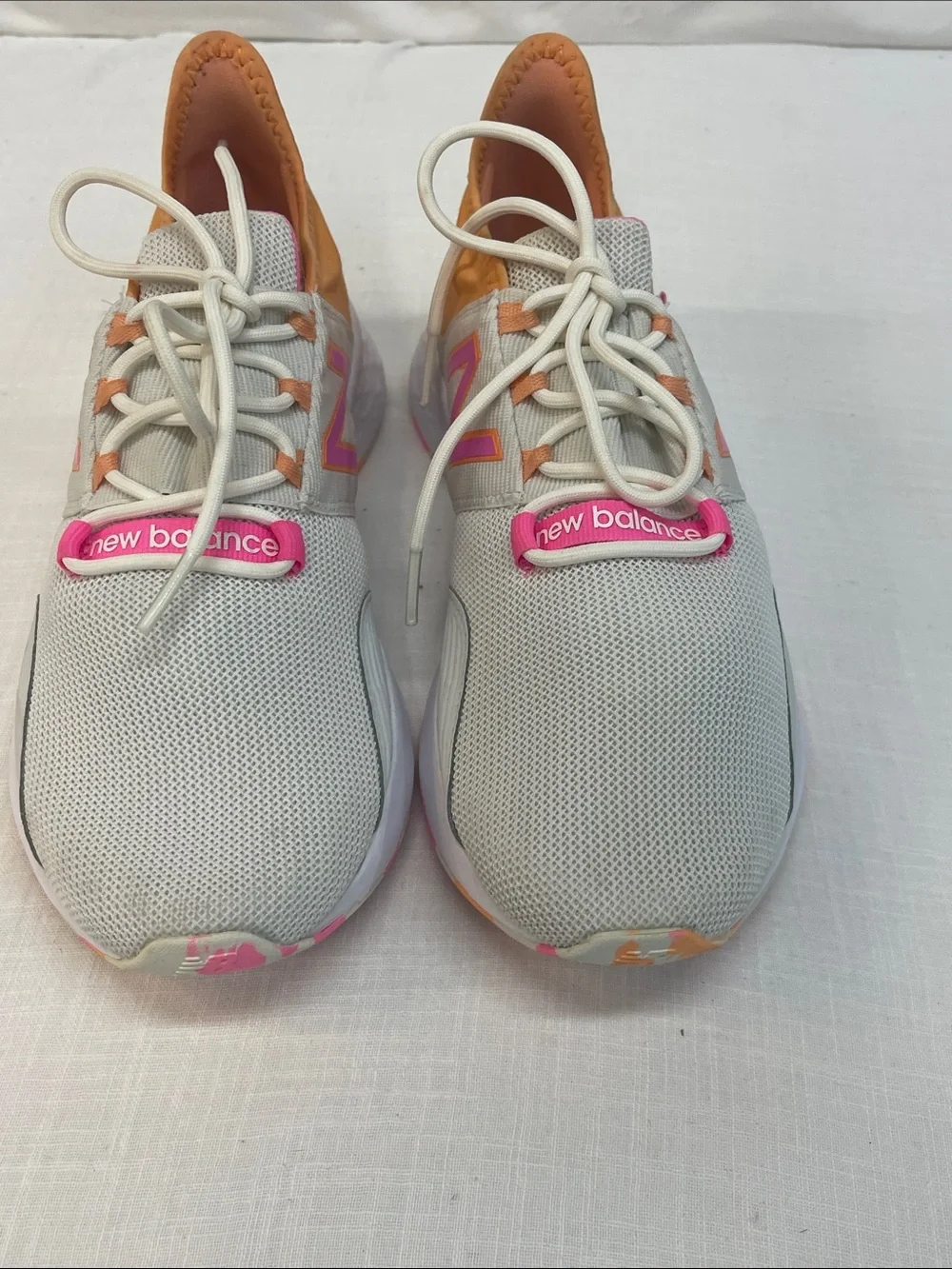 New Balance Women’s fresh foam Roav nimbus cloud in peach and hot pink size 6