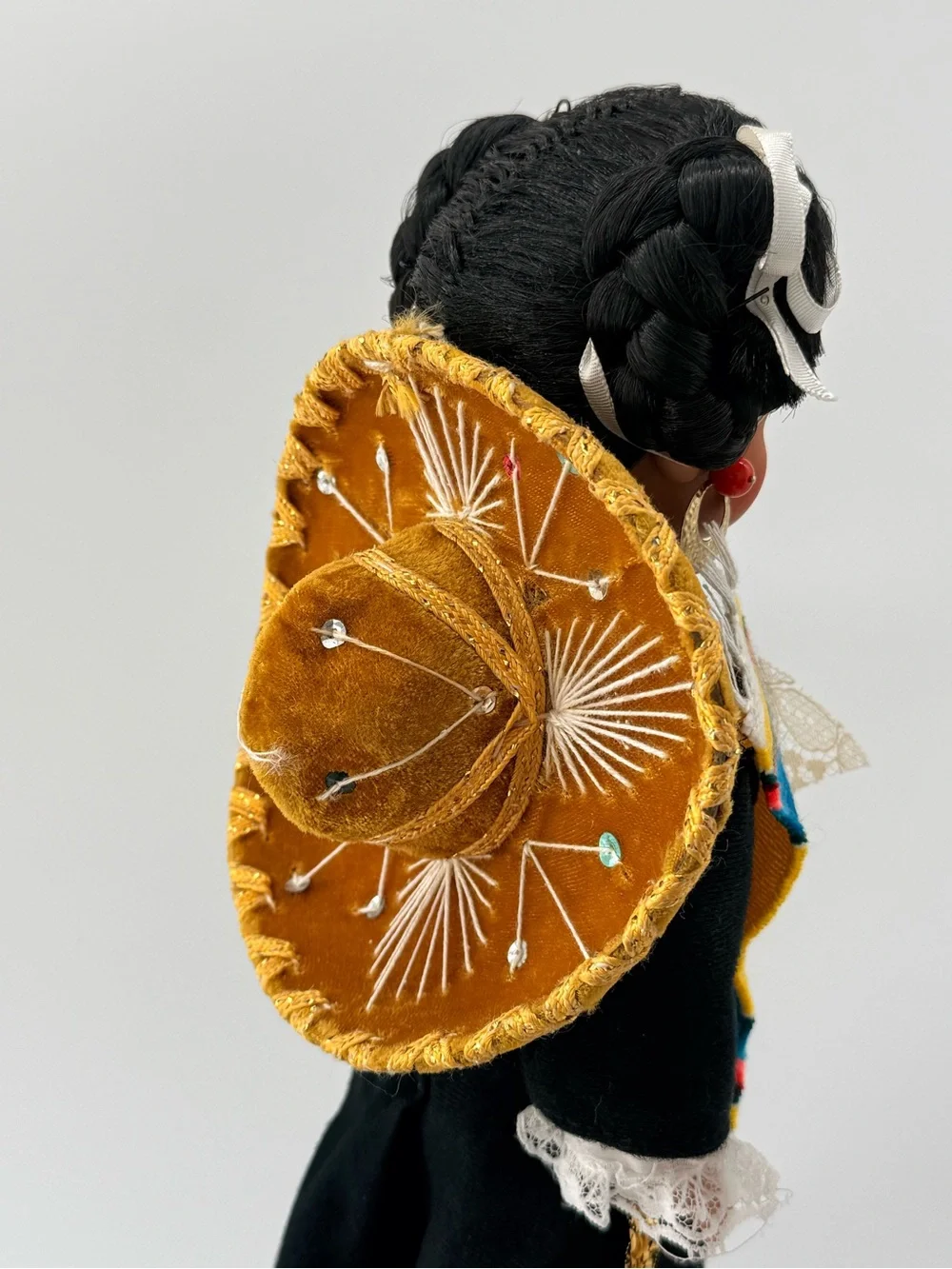 Traditional Black Cloth Doll with Yellow Sash and Lace Accents