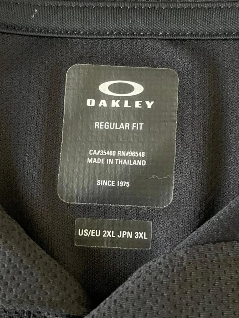 Oakley black polo