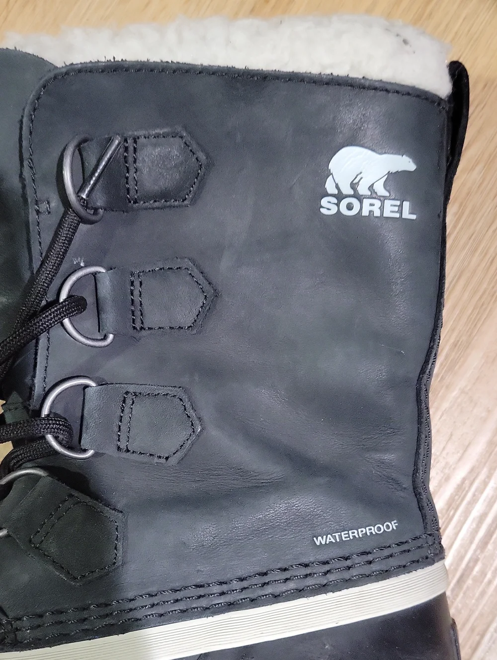 Sorel Black Leather Winter Boot with Cream Shearling Collar