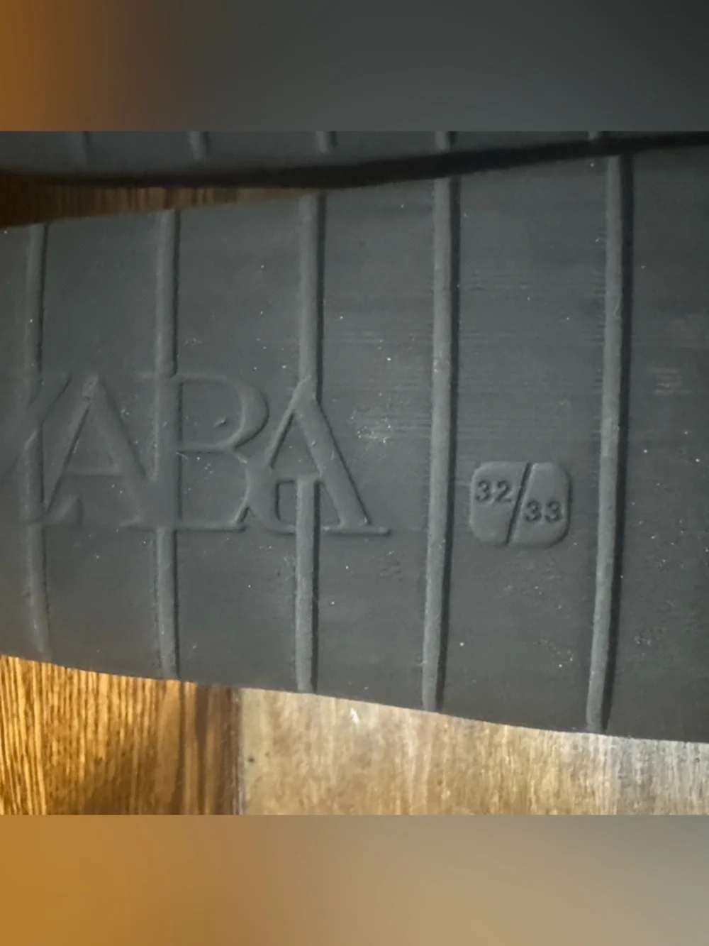 Zara sleek logo slide