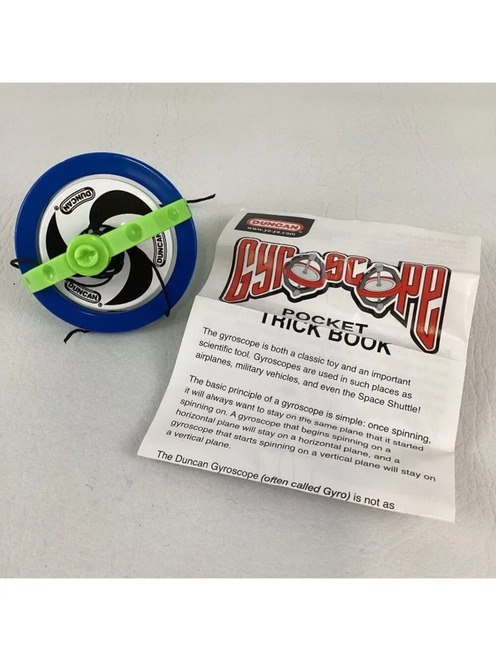 Duncan Gyroscope XT Spinning Top Physics Toy High Speed Green Pocket Trick Book