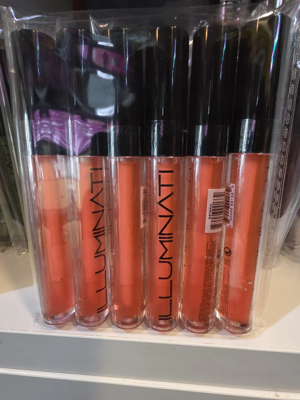 Lumina Coral Lip Gloss - Sheer Coral Shine
