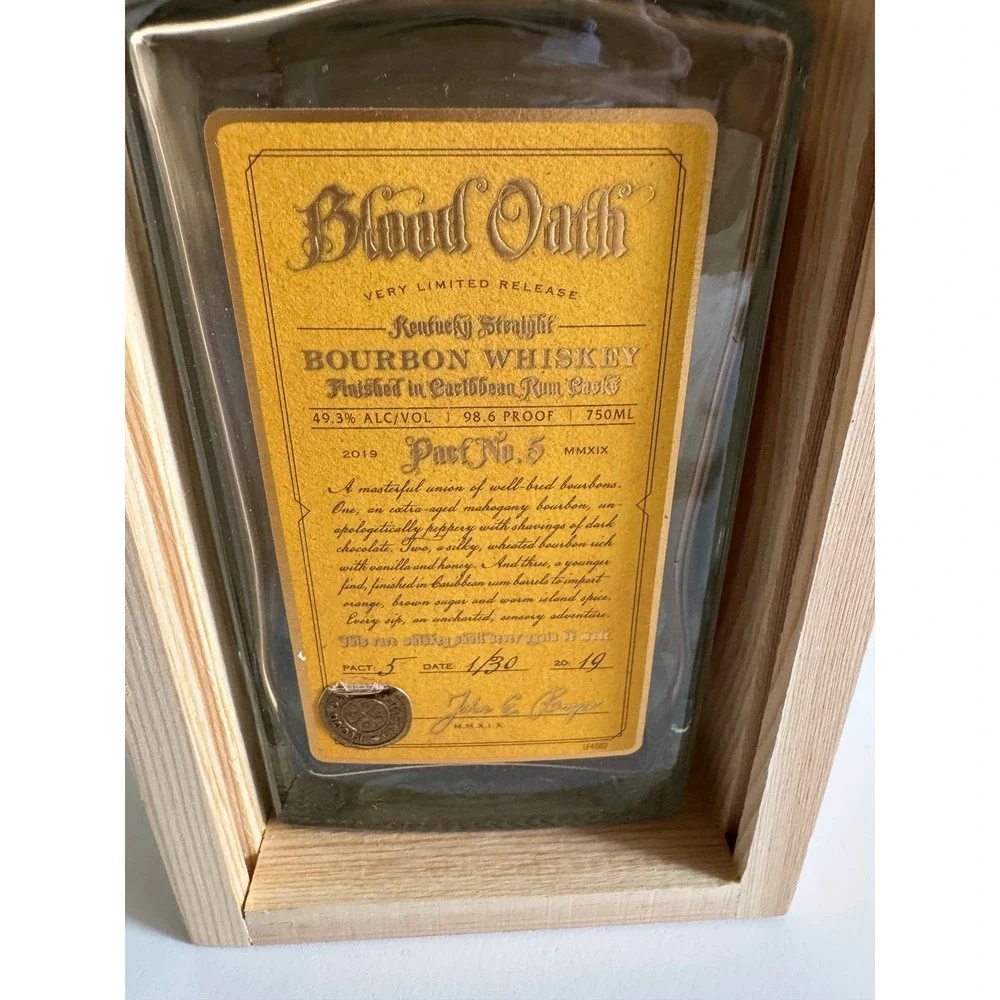 Blood Oath empty bottle