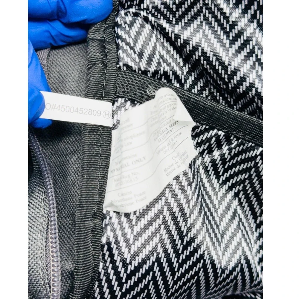 OGIO or sleek zippered