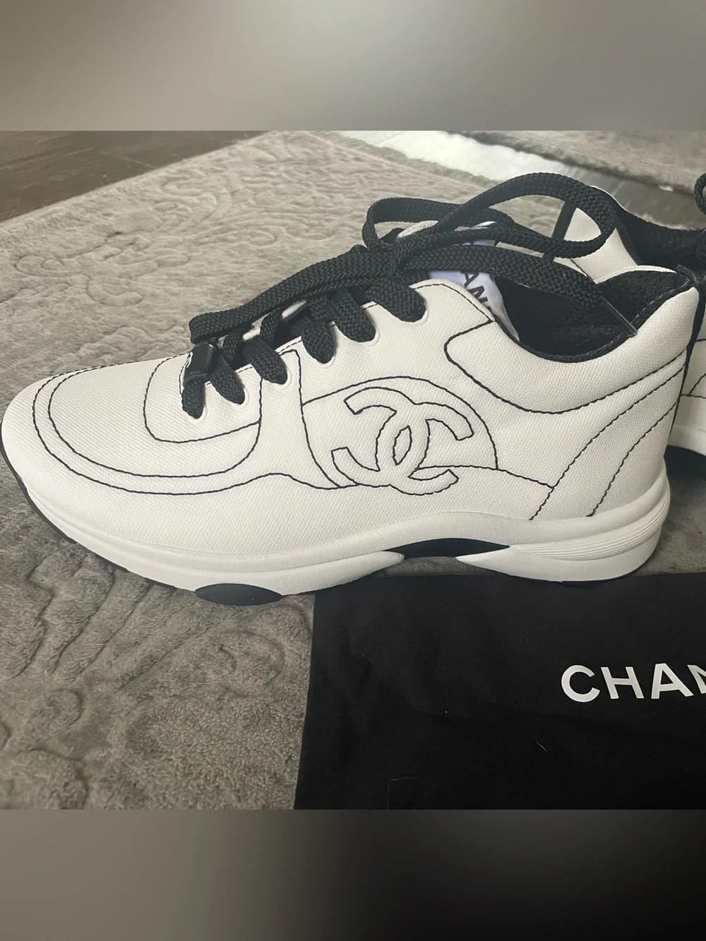 CHANEL White and Black Lace-Up Runner Sneakers